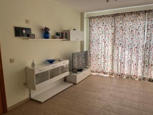 Telewizja i/lub zestaw kina domowego w obiekcie Vivienda Vacacional Maga