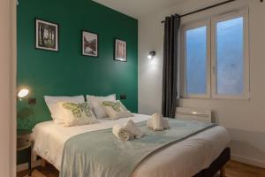 Ліжко або ліжка в номері Travel Homes - The Parc, next to Champ de Mars