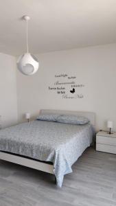 Ліжко або ліжка в номері Appartamento Gioia