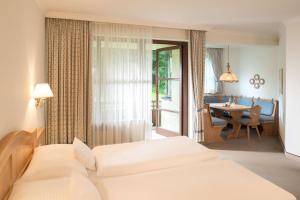 Postel nebo postele na pokoji v ubytování Dorint Sporthotel Garmisch-Partenkirchen
