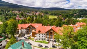 an aerial view of a town in the mountains at Stone Hill Apartament Sunrise in Szklarska Poręba