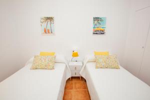 A bed or beds in a room at Cristina III