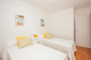 A bed or beds in a room at Cristina III