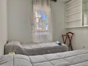 Postel nebo postele na pokoji v ubytování Alicante Golf Hoyo 18 4-6 Pax. piscina, wifi, parking privado. + 36 fotografií