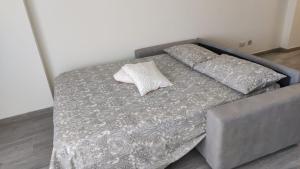 Ліжко або ліжка в номері Appartamento Gioia