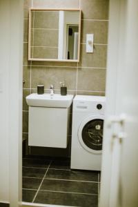 Et badeværelse på Elisabeth Downtown Suites