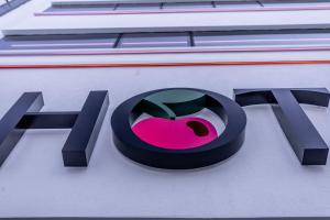 a sign on the side of a building at Pacha Hotel in Ibiza Town