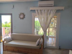 Posezení v ubytování Villa Mitselo Apartments