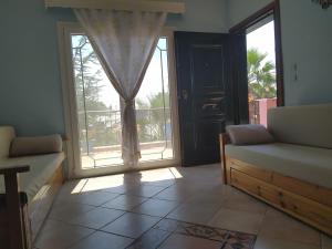 Posezení v ubytování Villa Mitselo Apartments