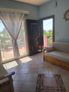 Posezení v ubytování Villa Mitselo Apartments