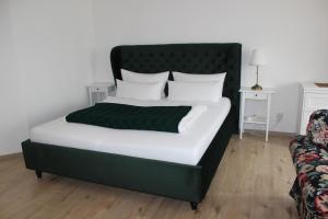 Ein Bett oder Betten in einem Zimmer der Unterkunft City-Appartement 12.2.
