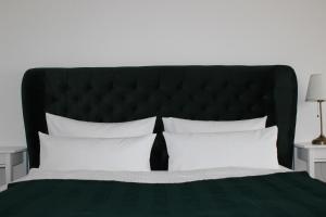 Ein Bett oder Betten in einem Zimmer der Unterkunft City-Appartement 12.2.