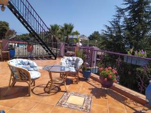 Balkón nebo terasa v ubytování Villa Mitselo Apartments + 37 fotografií