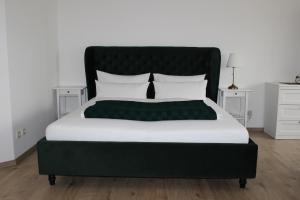 Ein Bett oder Betten in einem Zimmer der Unterkunft City-Appartement 12.2.