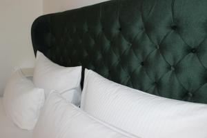Ein Bett oder Betten in einem Zimmer der Unterkunft City-Appartement 12.2.
