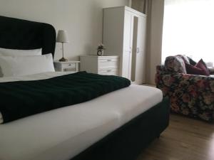Ein Bett oder Betten in einem Zimmer der Unterkunft City-Appartement 12.2.