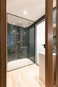 Ванна кімната в Hotel Casa Scaligeri