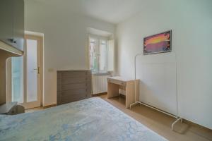 Postel nebo postele na pokoji v ubytování La Terrazza a Seccheto Sul Mare