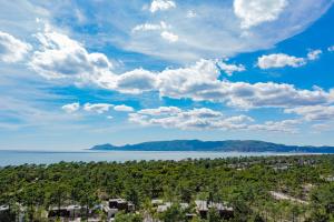 an aerial view of a city and the water at Pestana Troia Eco-Resort & Residences in Troia