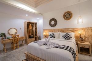 Ein Bett oder Betten in einem Zimmer der Unterkunft Miracle villa Canggu