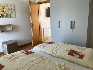 Ένα ή περισσότερα κρεβάτια σε δωμάτιο στο Landhaus Kogler