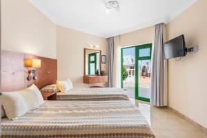 Postel nebo postele na pokoji v ubytování Las Adelfas + 79 fotografií