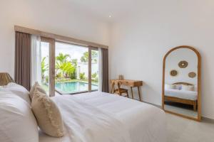 Postel nebo postele na pokoji v ubytování Villa Casa Cielo by OriVista + 16 fotografií