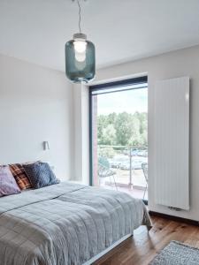 Postel nebo postele na pokoji v ubytování Apartament VIP CENTRUM
