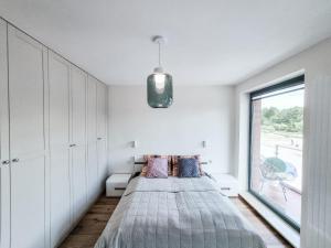 Posteľ alebo postele v izbe v ubytovaní Apartament VIP CENTRUM