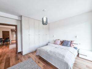 Posteľ alebo postele v izbe v ubytovaní Apartament VIP CENTRUM