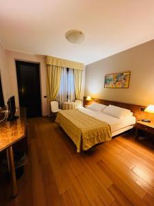 Posteľ alebo postele v izbe v ubytovaní Hotel Motel Europa
