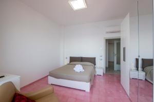 Кровать или кровати в номере Lily House Amalfi
