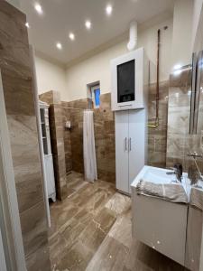 Kúpeľňa v ubytovaní Kalitka Apartman + 2 fotografie