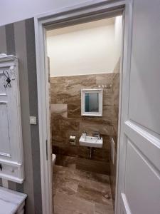 Kúpeľňa v ubytovaní Kalitka Apartman