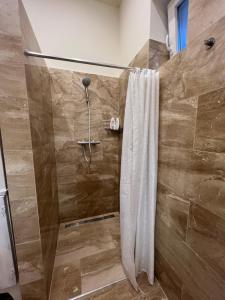 Kúpeľňa v ubytovaní Kalitka Apartman
