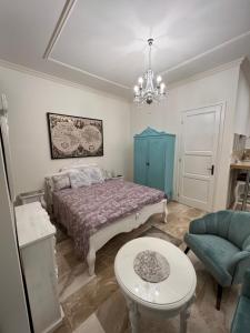 Posteľ alebo postele v izbe v ubytovaní Kalitka Apartman
