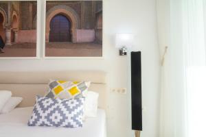 Łóżko lub łóżka w pokoju w obiekcie Townhouse El Romeral