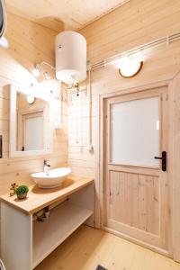 a bathroom with a sink and a window at Marina Holiday in Ustka +60 photos