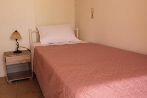 Posteľ alebo postele v izbe v ubytovaní Dimokritos Apartment