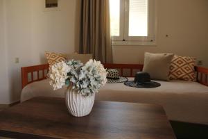 Posedenie v ubytovaní Dimokritos Apartment