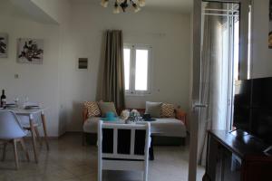 Posedenie v ubytovaní Dimokritos Apartment