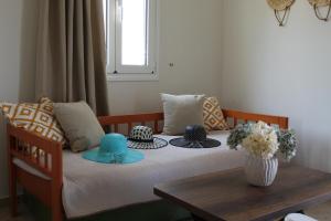 Posteľ alebo postele v izbe v ubytovaní Dimokritos Apartment