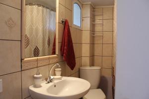 Kúpeľňa v ubytovaní Dimokritos Apartment