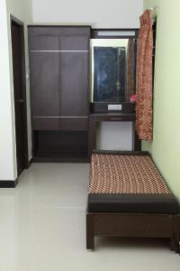 Postel nebo postele na pokoji v ubytování Jeyam Residency, Kumbakonam
