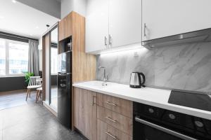 Dapur atau dapur kecil di WallStreet, The Luxury Suites