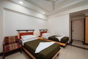 Postel nebo postele na pokoji v ubytování Hotel Balwas International