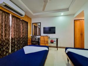 TV a/nebo společenská místnost v ubytování Hotel Balwas International