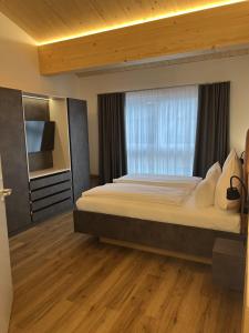 A bed or beds in a room at W-40.COM
