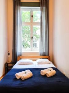 Posteľ alebo postele v izbe v ubytovaní Classic apartments Pilsudskiego street