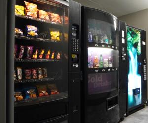 a vending machine with food and drinks in it at Days Inn by Wyndham Niagara Falls Near The Falls in Niagara Falls